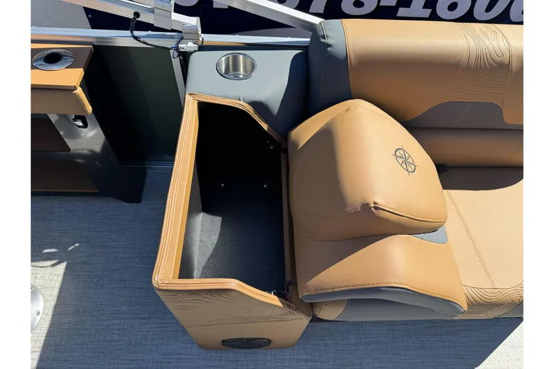 Slide: The Image of 2026 Tahoe Pontoon Geofish RF 21 seat with storage compartment and cup holder. - 22