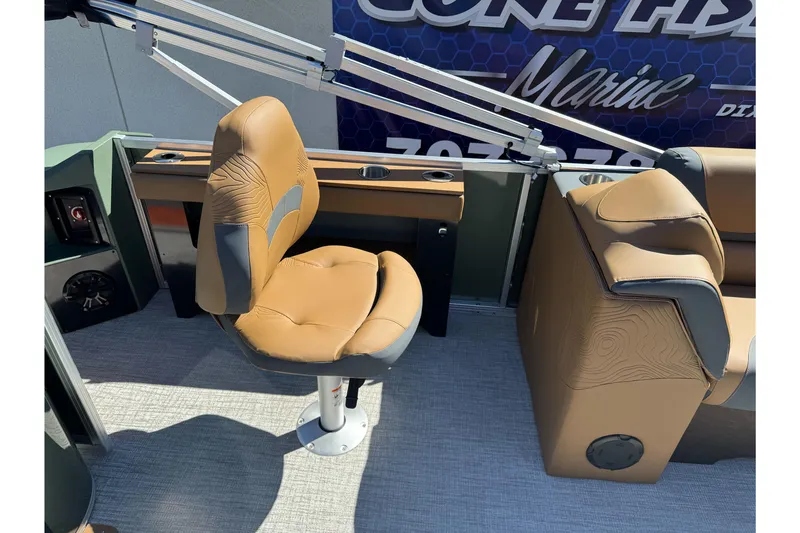Slide: The Image of 2026 Tahoe Pontoon Geofish RF 21 interior with tan seating and modern design. - 20