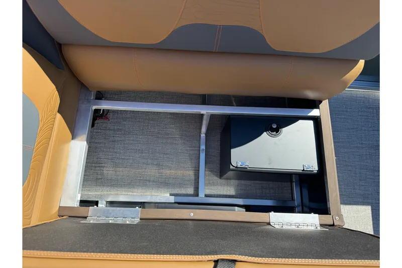 Slide: The Image of Under-seat storage compartment in 2026 Tahoe Pontoon Geofish RF 21 boat. - 23
