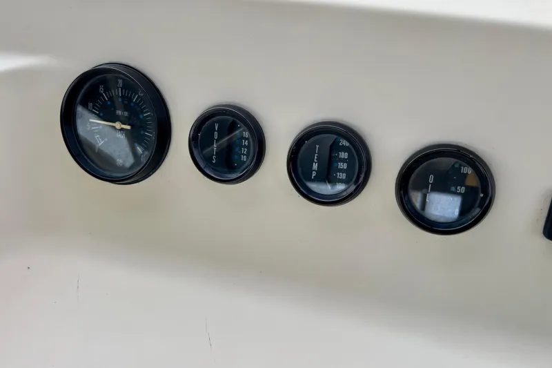 Slide: The Image of Dashboard gauges of a 1985 Tollycraft 48 Cockpit Motor Yacht. - 33
