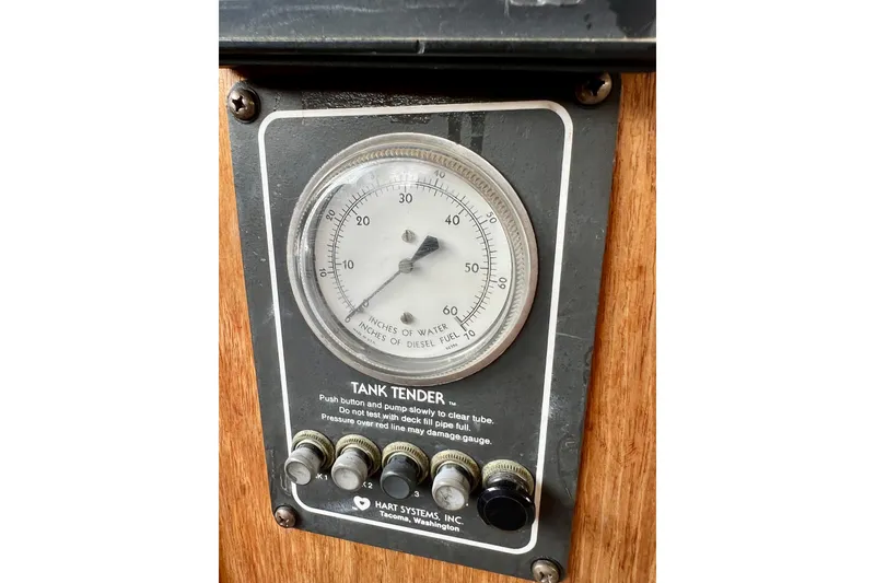 Slide: The Image of Gauge panel on 1985 Tollycraft 48 Cockpit Motor Yacht, displaying tank levels. - 58