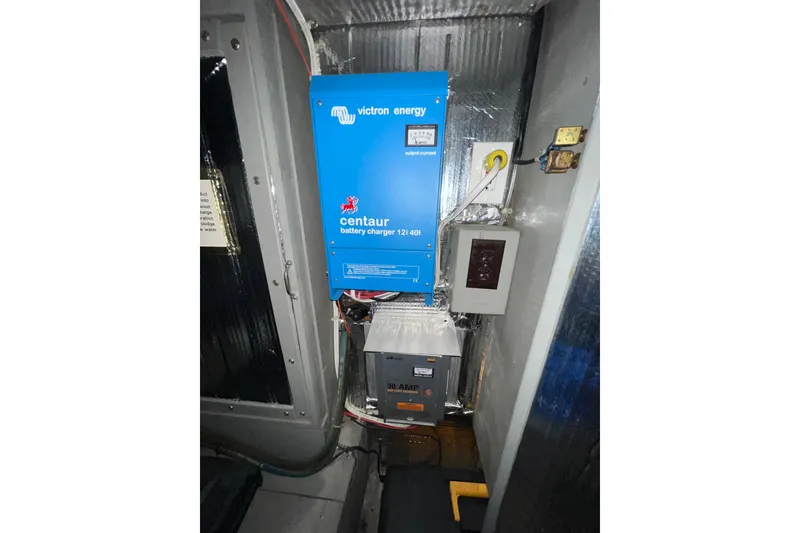 Slide: The Image of Electrical system with Victron Energy Centaur battery charger in 1985 Tollycraft 48 Cockpit Motor Yacht. - 94