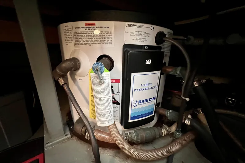 Slide: The Image of Marine water heater in 1985 Tollycraft 48 Cockpit Motor Yacht engine room. - 95