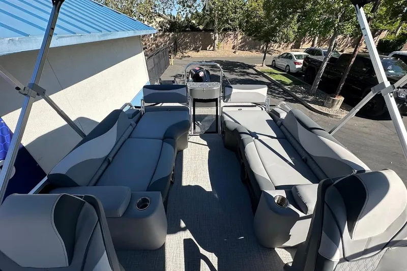 Slide: The Image of 2026 Tahoe Pontoon LTZ Quad Lounger Shift 23 with spacious seating and modern design. - 22