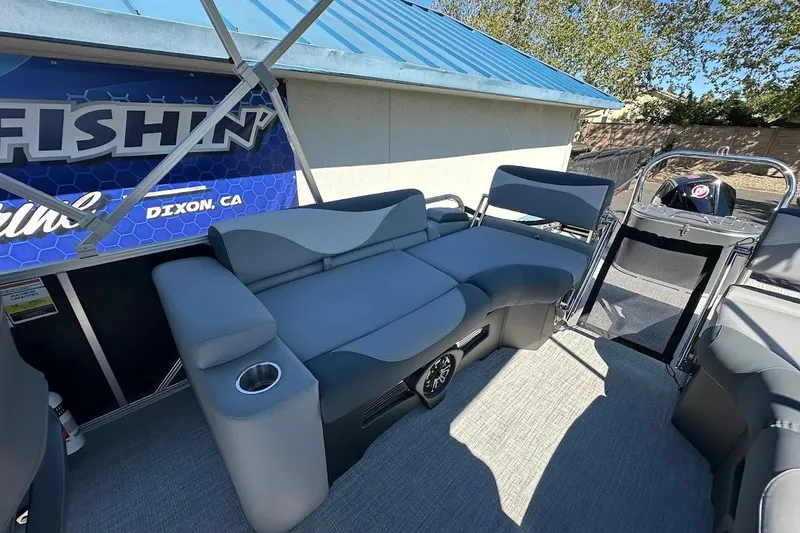 Slide: The Image of 2026 Tahoe Pontoon LTZ Quad Lounger Shift 23 interior with comfortable seating and modern design. - 23