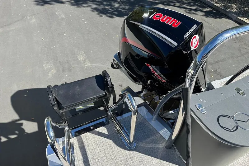 Slide: The Image of 2026 Tahoe Pontoon LTZ Quad Lounger Shift 23 with Mercury outboard motor. - 30