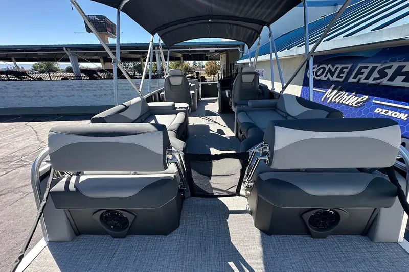 Slide: The Image of 2026 Tahoe Pontoon LTZ Quad Lounger Shift 23 with spacious seating and canopy. - 31