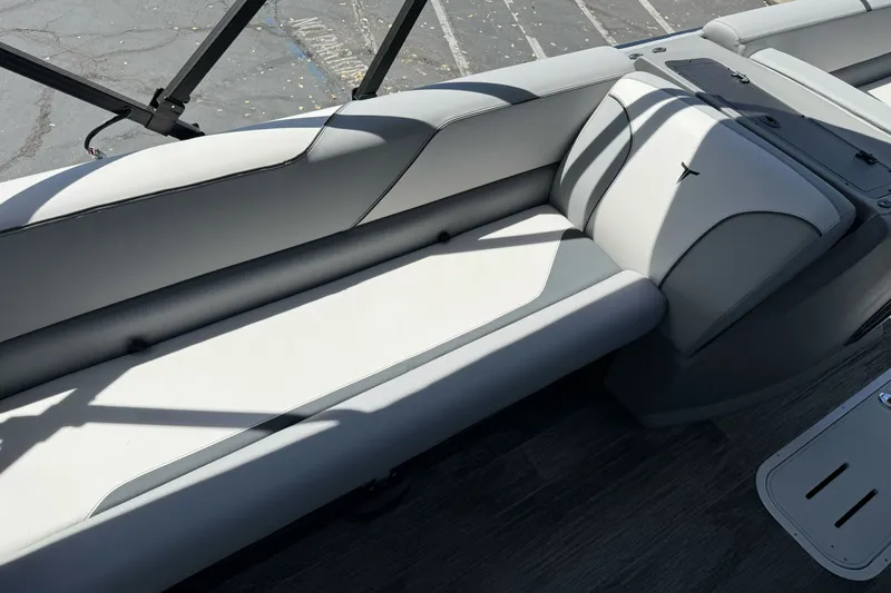 Slide: The Image of 2026 Tahoe Pontoon Sport 85 Elite Windshield 25 interior seating, gray upholstery. - 14