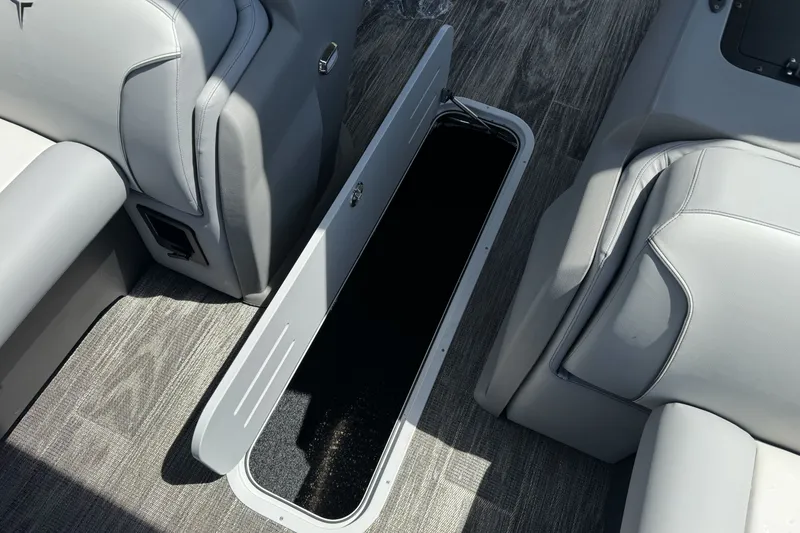 Slide: The Image of 2026 Tahoe Pontoon Sport 85 Elite Windshield 25 interior storage compartment. - 10