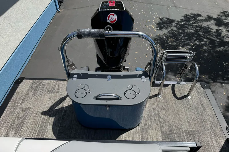 Slide: The Image of 2026 Tahoe Pontoon Sport 85 Elite Windshield 25, rear view with motor and ladder. - 17