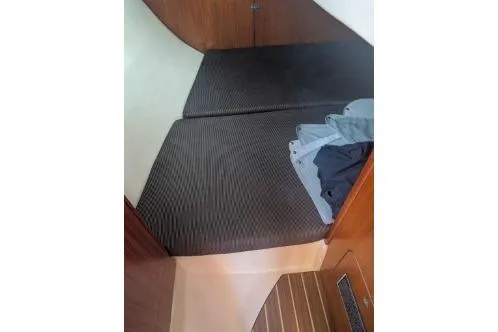 Slide: The Image of Interior cabin view of a 2004 Hunter 33 sailboat with double berth. - 29