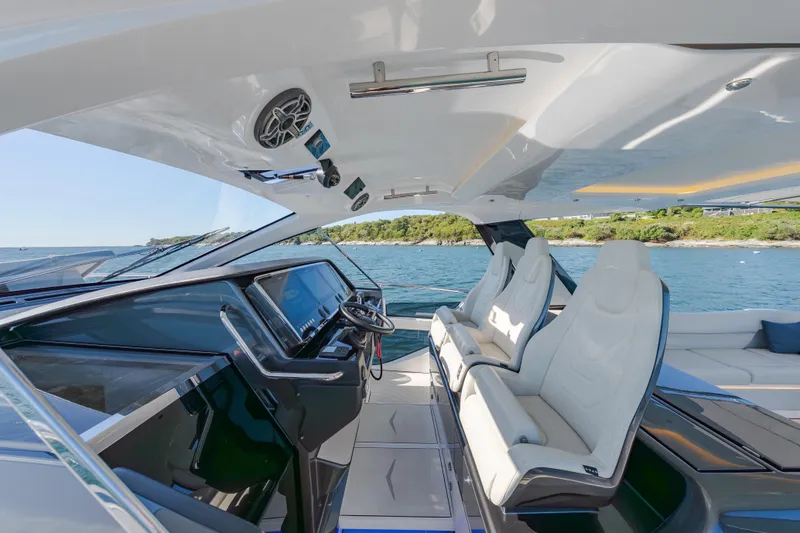 Slide: The Image of Luxurious interior of 2023 Azimut Verve 47 yacht with sleek design and modern controls. - 16