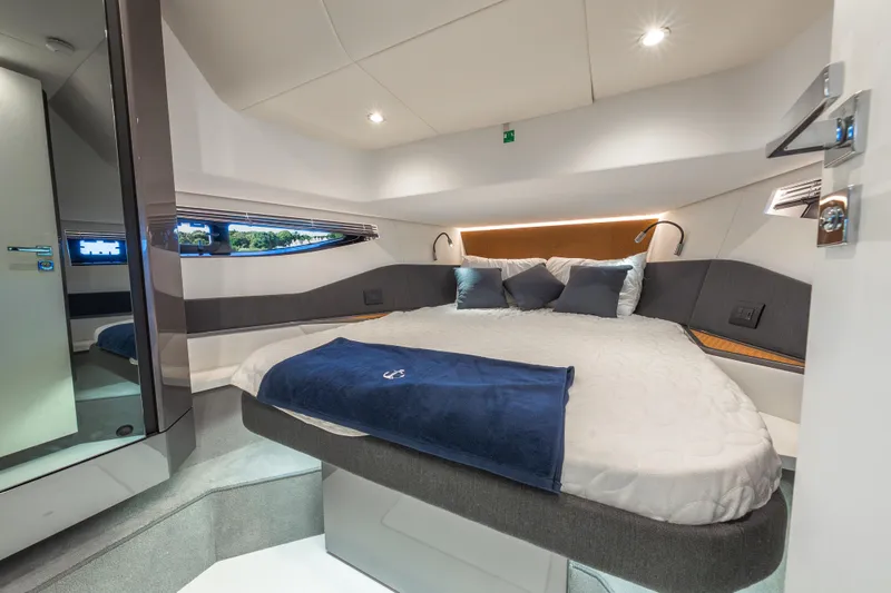 Slide: The Image of Luxurious cabin interior of 2023 Azimut Verve 47 yacht with modern bedding. - 30