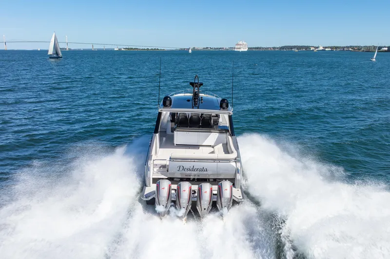 Slide: The Image of 2023 Azimut Verve 47 yacht cruising on open water with powerful engines. - 42