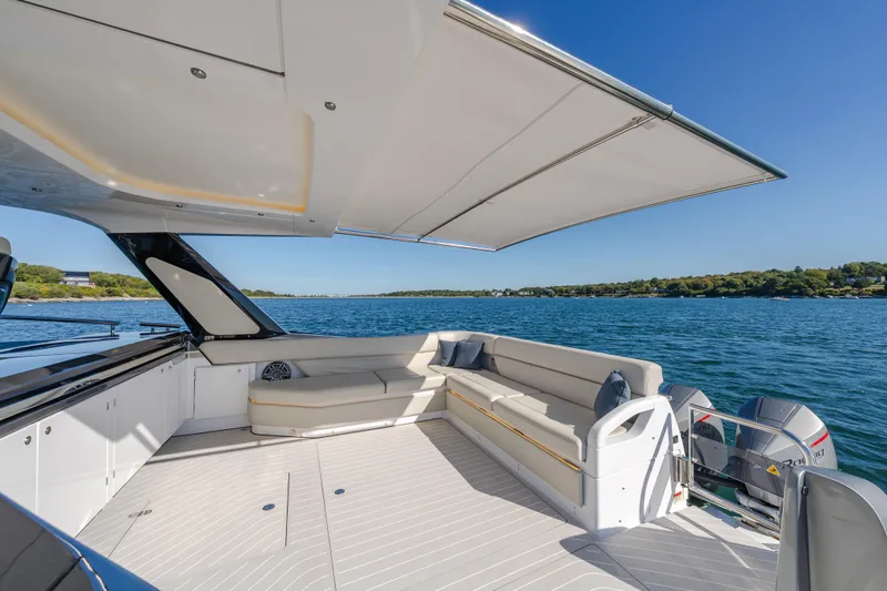 Slide: The Image of Luxurious 2023 Azimut Verve 47 yacht with spacious deck and scenic ocean view. - 6