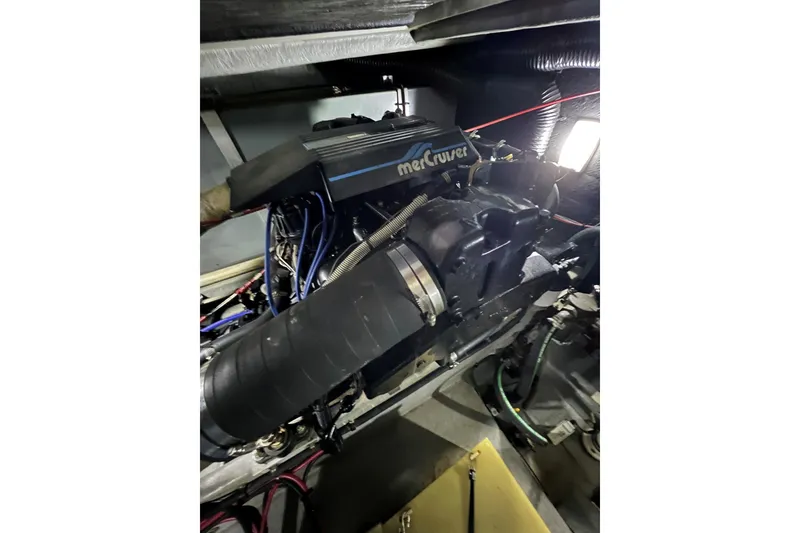 Slide: The Image of Engine compartment of a 1991 Sea Ray 390 Express Cruiser with MerCruiser engine. - 36
