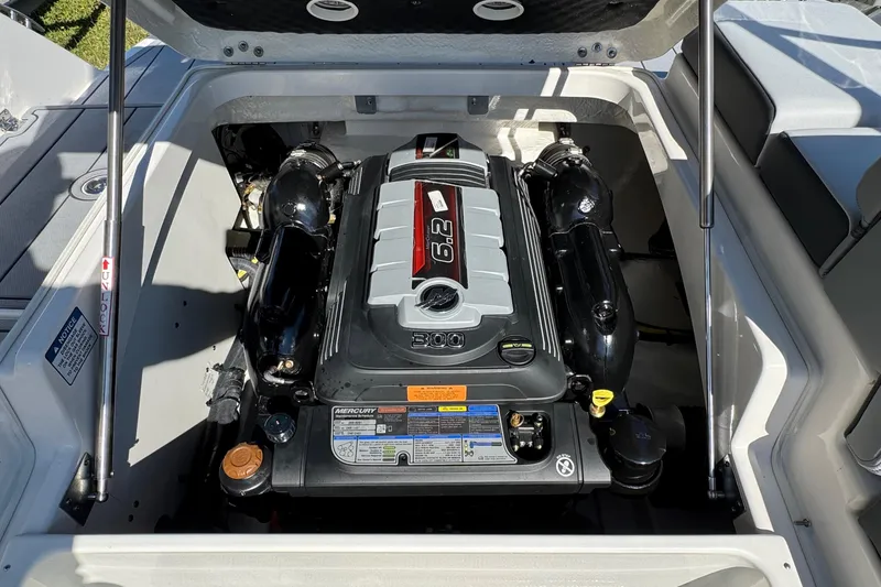Slide: The Image of Engine compartment of 2026 Chaparral SSX 4 boat, featuring a powerful Mercury 6.2L engine. - 16
