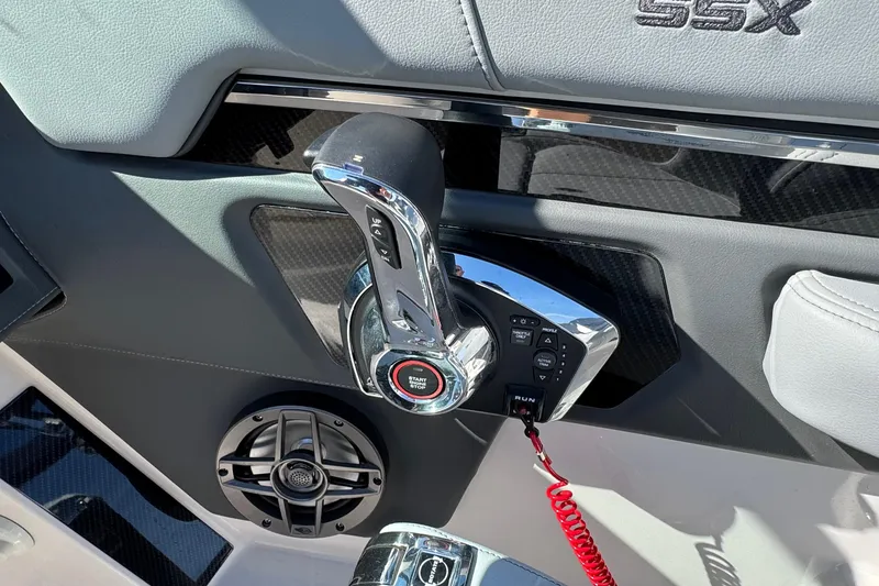 Slide: The Image of Throttle control panel of 2026 Chaparral SSX 4 boat with start/stop button. - 23
