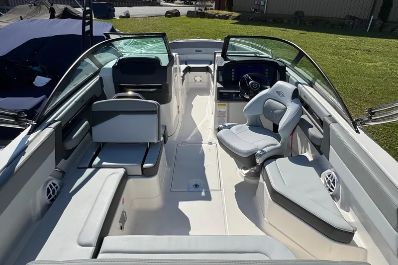 Slide: The Image of 2026 Chaparral SSX 4 boat interior with modern seating and steering wheel. - 28