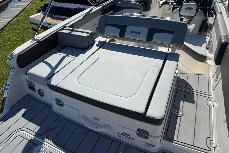 Slide: The Image of 2026 Chaparral SSX 4 boat interior with spacious seating and modern design. - 9