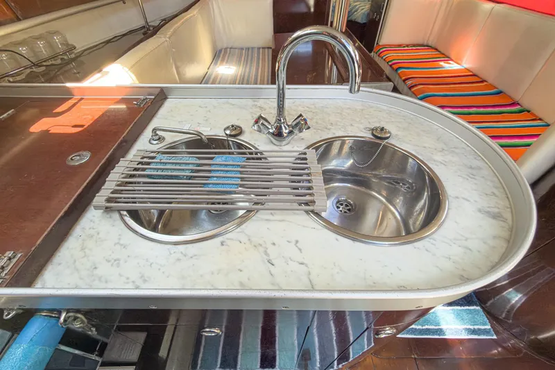 Slide: The Image of Marble countertop with dual sinks in 1993 Beneteau First 38 s5 yacht interior. - 12