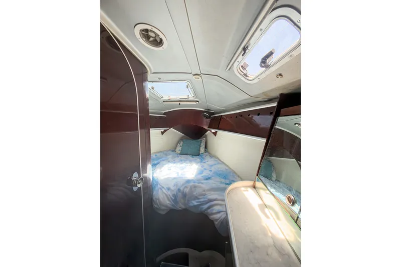 Slide: The Image of Cozy cabin interior of 1993 Beneteau First 38 s5 sailboat with skylight and bedding. - 20