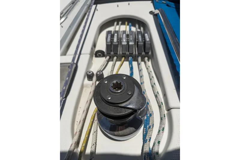 Slide: The Image of Winch and ropes on 1993 Beneteau First 38 s5 sailboat deck. - 22