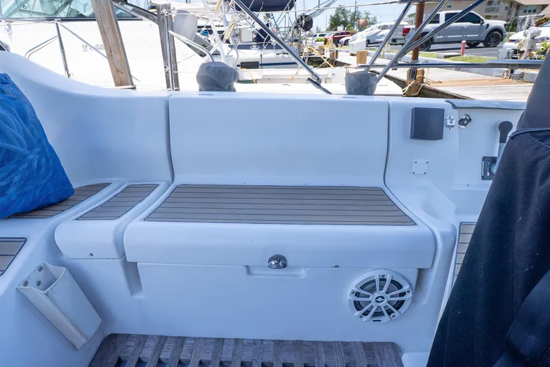 Slide: The Image of Cockpit seating area of a 1993 Beneteau First 38 s5 sailboat with teak accents. - 5