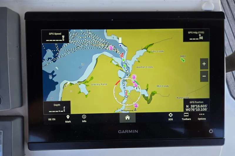 Slide: The Image of Garmin GPS display on a 2003 Beneteau 393 sailboat, showing navigation map and coordinates. - 16