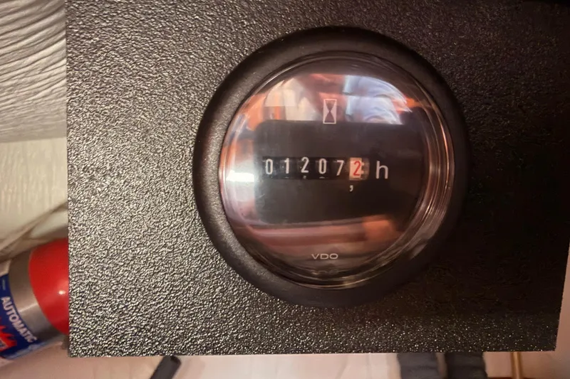 Slide: The Image of Hour meter showing 1207.2 hours on 2008 Hunter 45 Deck Salon. - 102