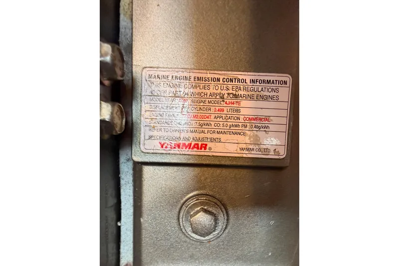 Slide: The Image of Marine engine emission control label on a 2008 Hunter 45 Deck Salon. - 114