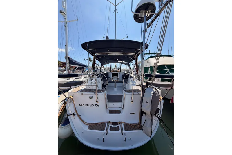 Slide: The Image of 2008 Hunter 45 Deck Salon sailboat docked in San Diego marina. - 13