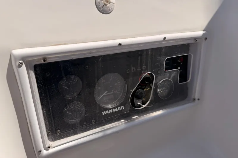 Slide: The Image of Control panel of a 2008 Hunter 45 Deck Salon sailboat with Yanmar engine gauges. - 19