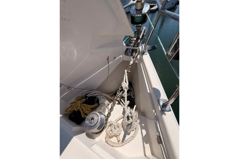 Slide: The Image of Anchor and ropes on 2008 Hunter 45 Deck Salon sailboat, docked in marina. - 32