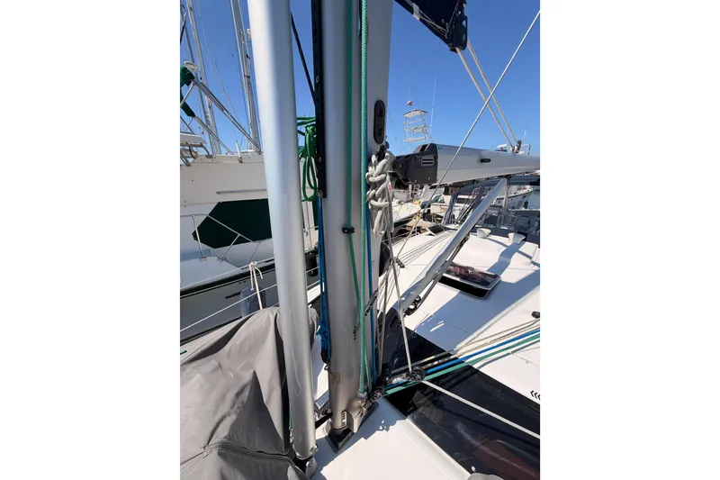 Slide: The Image of 2008 Hunter 45 Deck Salon sailboat mast and rigging details at marina. - 35