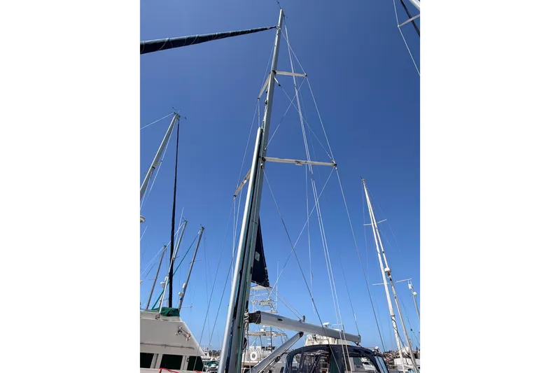 Slide: The Image of Sailboat mast of 2008 Hunter 45 Deck Salon against clear blue sky. - 4