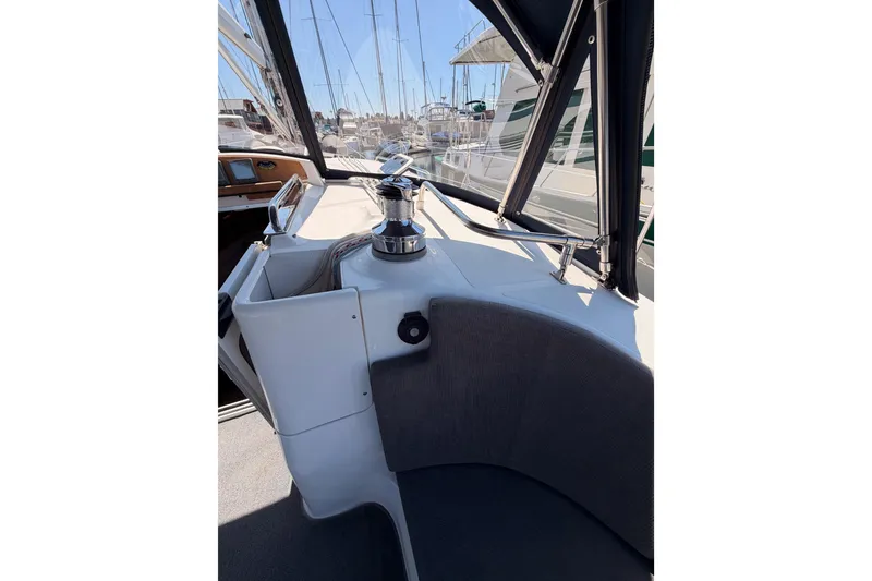 Slide: The Image of Interior view of 2008 Hunter 45 Deck Salon sailboat cockpit with winch and seating. - 44