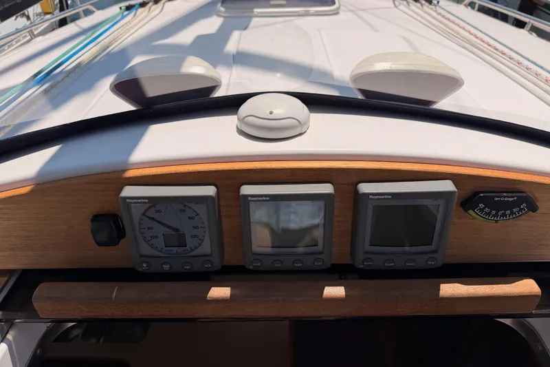 Slide: The Image of Control panel of 2008 Hunter 45 Deck Salon sailboat with Raymarine instruments. - 47
