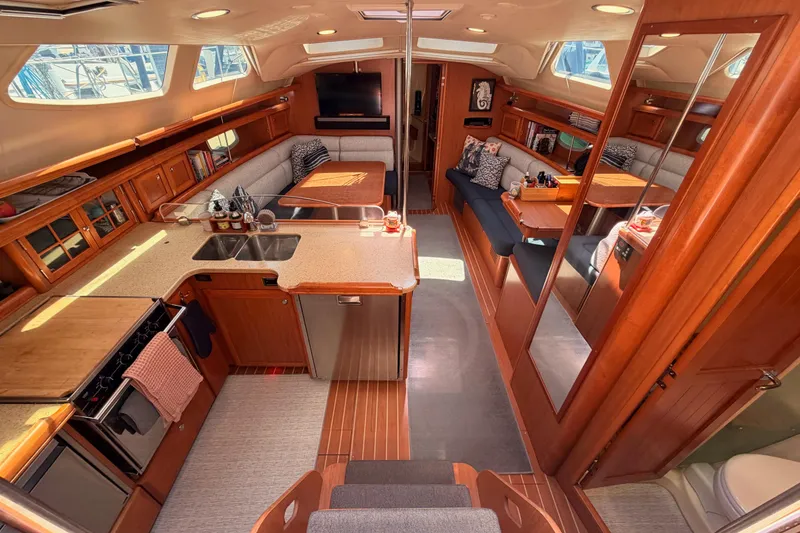 Slide: The Image of Luxurious interior of 2008 Hunter 45 Deck Salon yacht with spacious seating and modern amenities. - 48