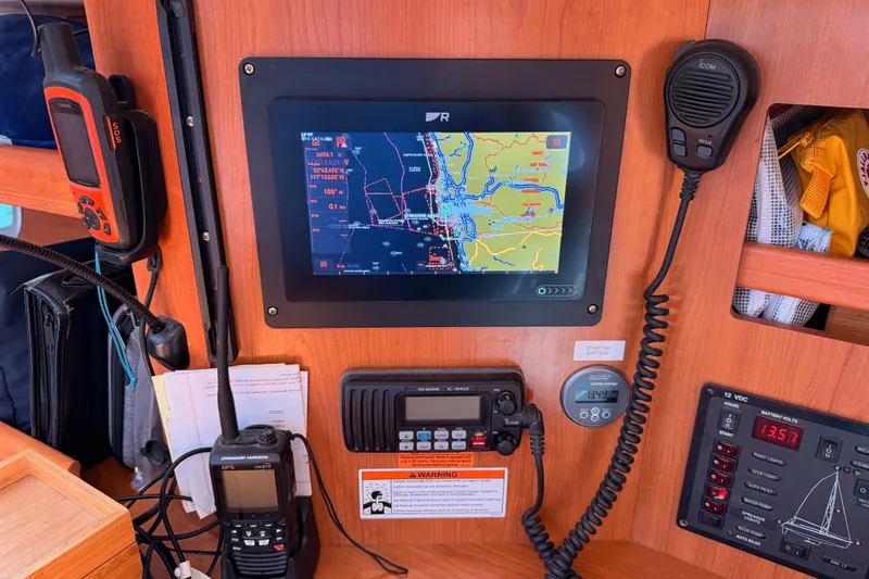 Slide: The Image of Control panel of a 2008 Hunter 45 Deck Salon with navigation equipment. - 65