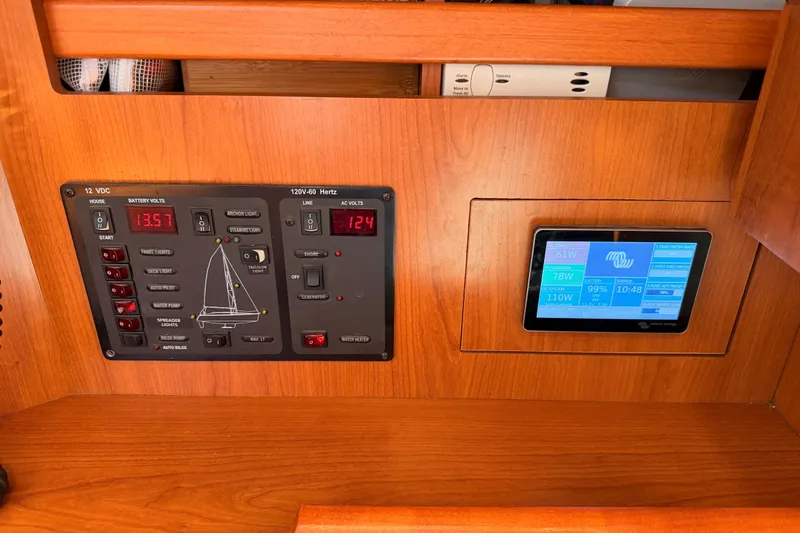 Slide: The Image of Control panel of a 2008 Hunter 45 Deck Salon sailboat with digital display. - 66