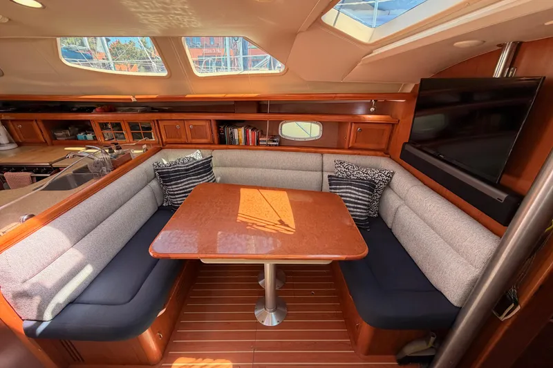 Slide: The Image of Luxurious interior of 2008 Hunter 45 Deck Salon with cozy seating and elegant wood finishes. - 71