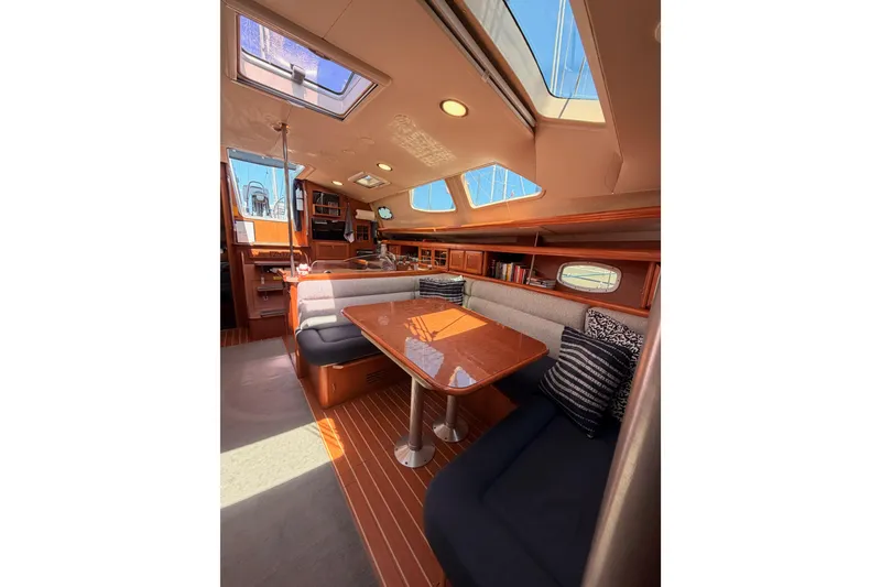 Slide: The Image of Luxurious interior of 2008 Hunter 45 Deck Salon yacht with elegant seating and skylights. - 85