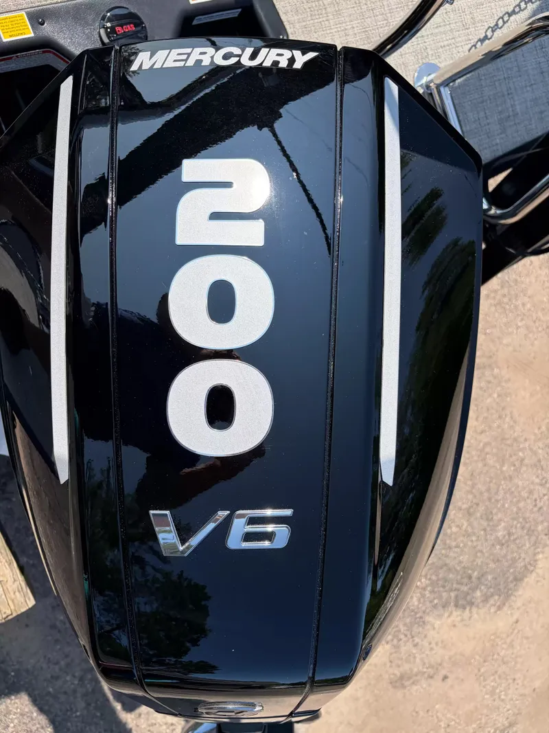 Slide: The Image of Close-up of a Mercury 200 V6 outboard motor. - 11