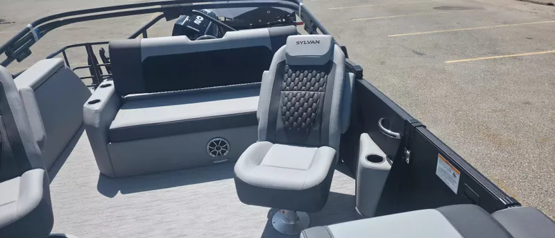 Slide: The Image of The image shows the interior of a 2026 Sylvan X3 ULZ FG/TT boat with gray seating. - 8
