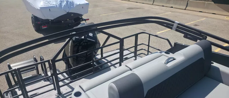 Slide: The Image of The image shows the deck of a 2026 Sylvan X3 ULZ FG/TT boat with gray seating. - 10