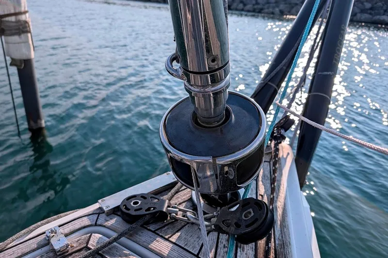 Slide: The Image of Close-up of a 2006 Grand Soleil 50 sailboat's deck hardware and rigging by the water. - 20