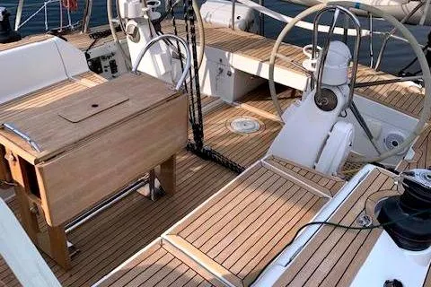 Slide: The Image of 2006 Grand Soleil 50 yacht cockpit with teak decking and dual steering wheels. - 4