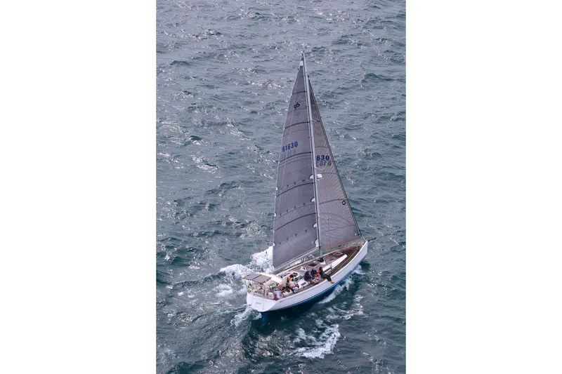 Slide: The Image of Sailing yacht Grand Soleil 50 (2006) navigating through open waters. - 1