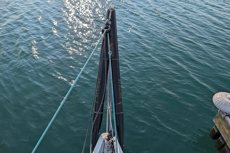 Slide: The Image of Grand Soleil 50 sailboat mast and rigging over sparkling water, 2006 model. - 16
